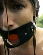 Longdozen - Gagged slave waited out in...